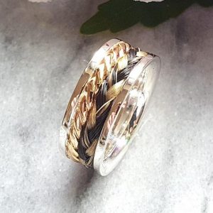 Ring aus 925er Silber  mit Kordel aus 333er Gold